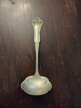 Antique Wm Rogers Oneida Ardsley-Empress Cream Ladle 5 7/8" Curved Handle